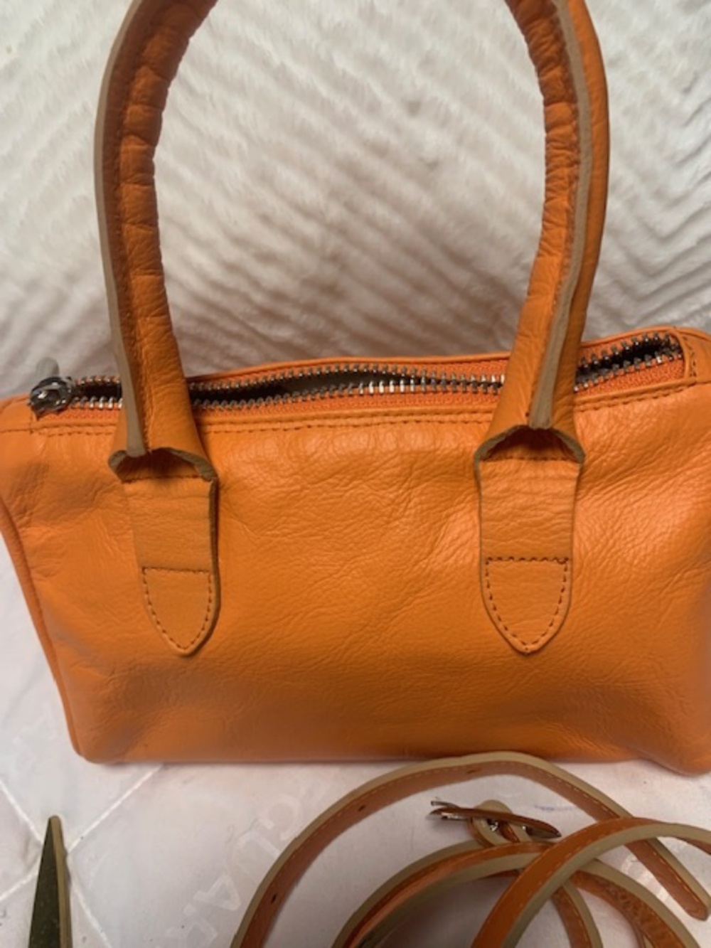 Orange leather cross body bag